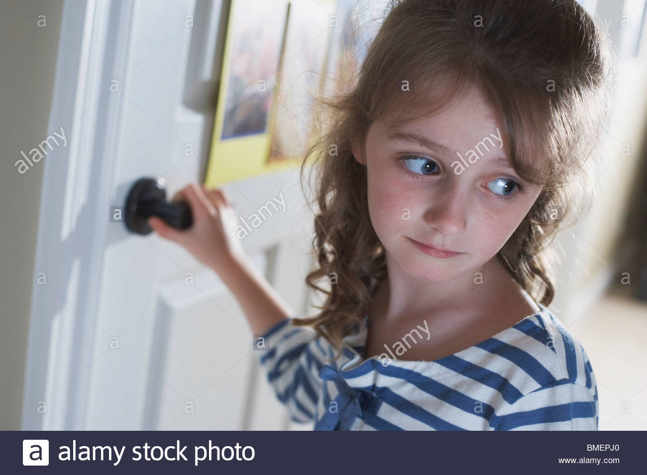 A Girl Turning A Doorknob To Leave Stock Photo 29828568 Alamy pertaining to sizing 1300 X 956