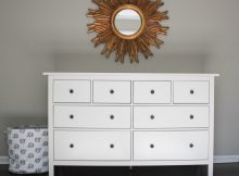 White Wooden Dresser For Nursery With Eight Drawers And Black Knobs throughout sizing 1024 X 977
