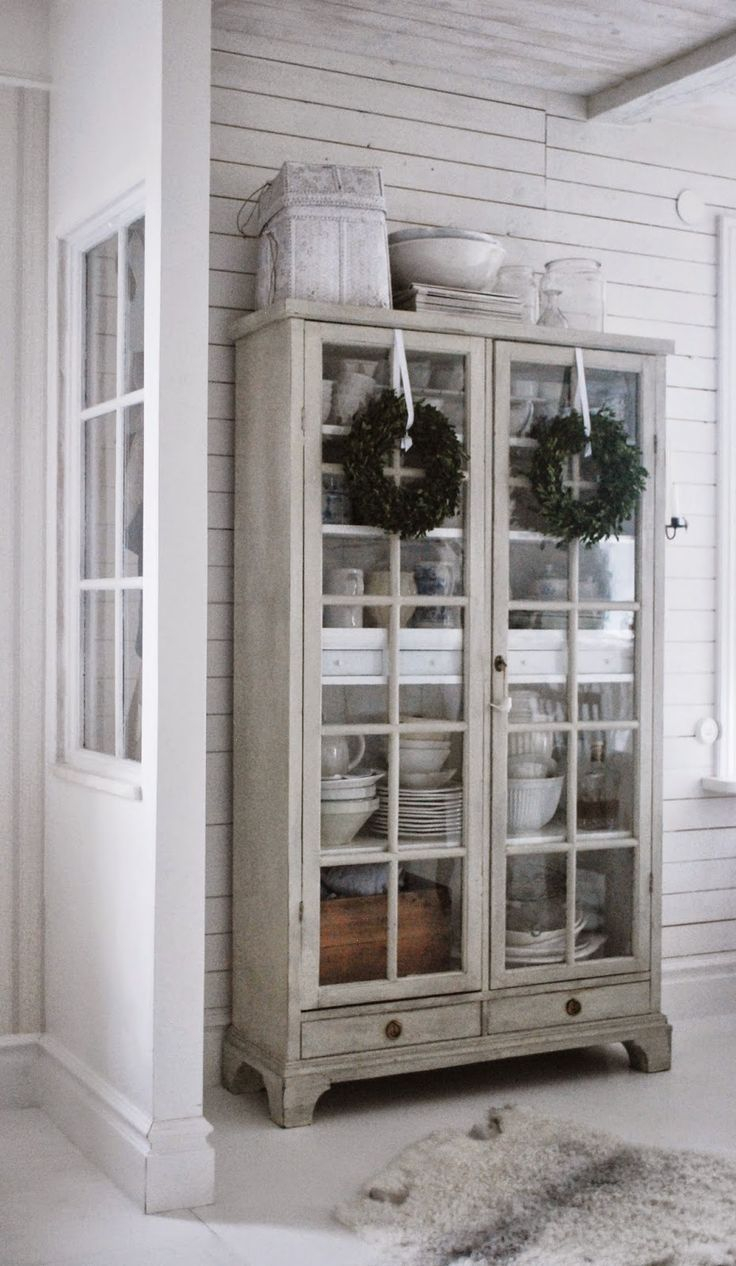 Armoire Hutch With Glass Doors And Those Perfect Boxwood Wreaths pertaining to dimensions 736 X 1266