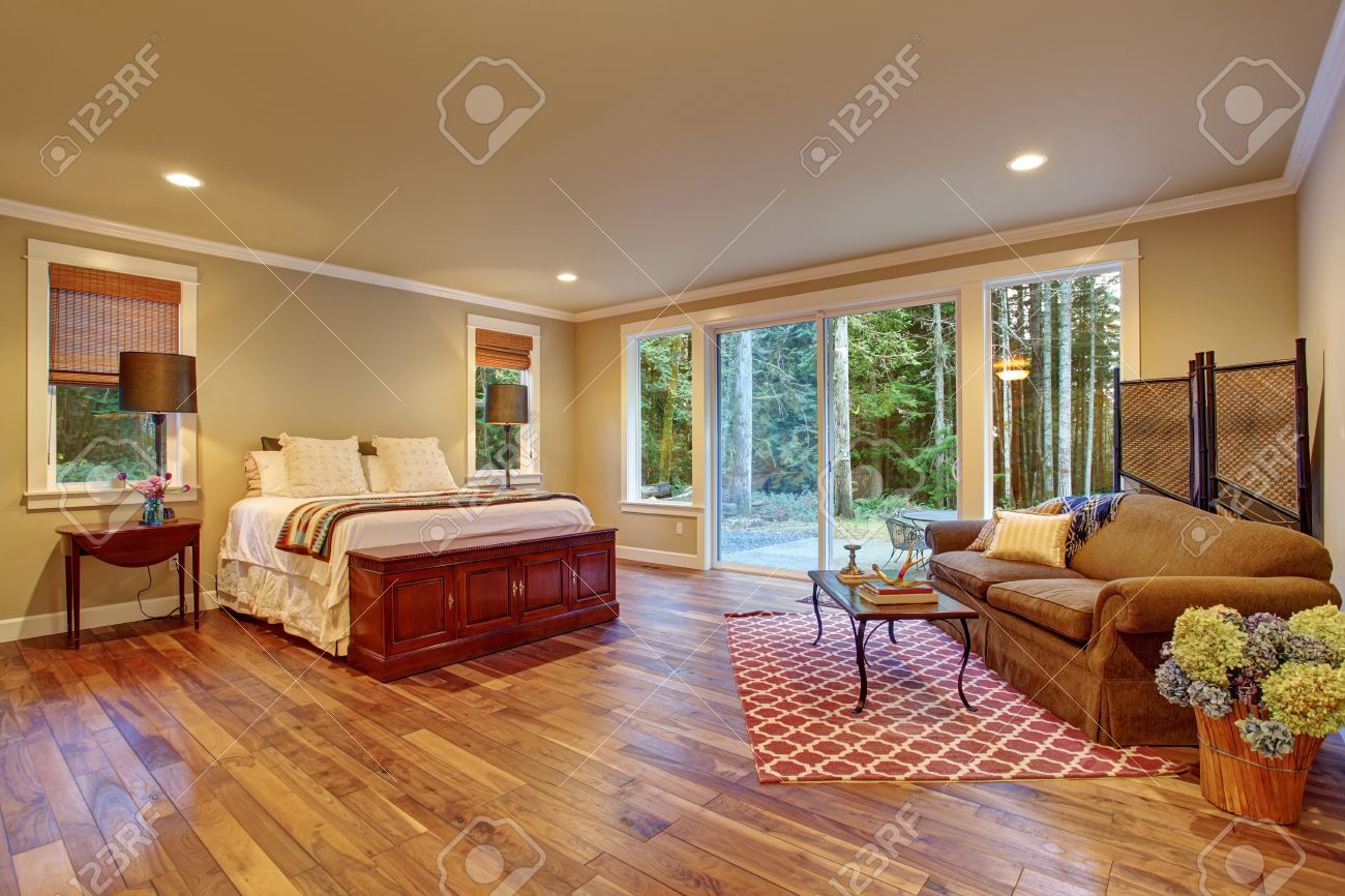 Large Master Bedroom With Hardwood Floor And Sliding Glass Door pertaining to proportions 1300 X 866