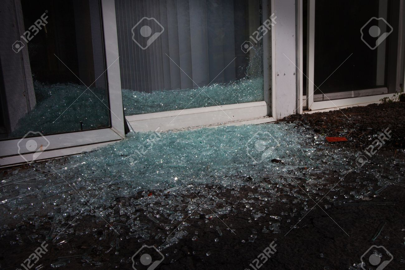 Shattered Glass In The Night Near A Sliding Glass Door Stock Photo throughout dimensions 1300 X 869