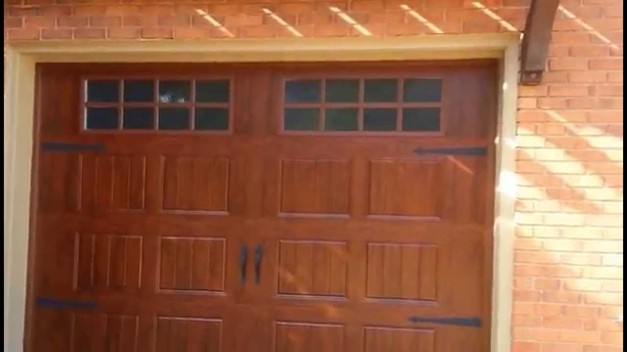 Steel Garage Doors That Mimic Look Of Wood Affordablegaragedoors pertaining to measurements 1280 X 720