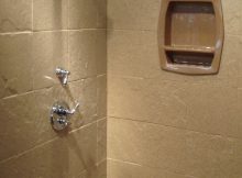 9 Frequently Asked Questions About Stone Solid Surface Shower Wall inside sizing 735 X 1102