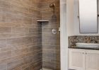 A Faux Wood Tile Shower Featuring Dyrewood Cinnamon Faux Wood in sizing 1800 X 2702