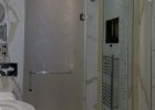 A Laminated Glass Shower Door Featuring An Etched Design Across The regarding size 781 X 1200