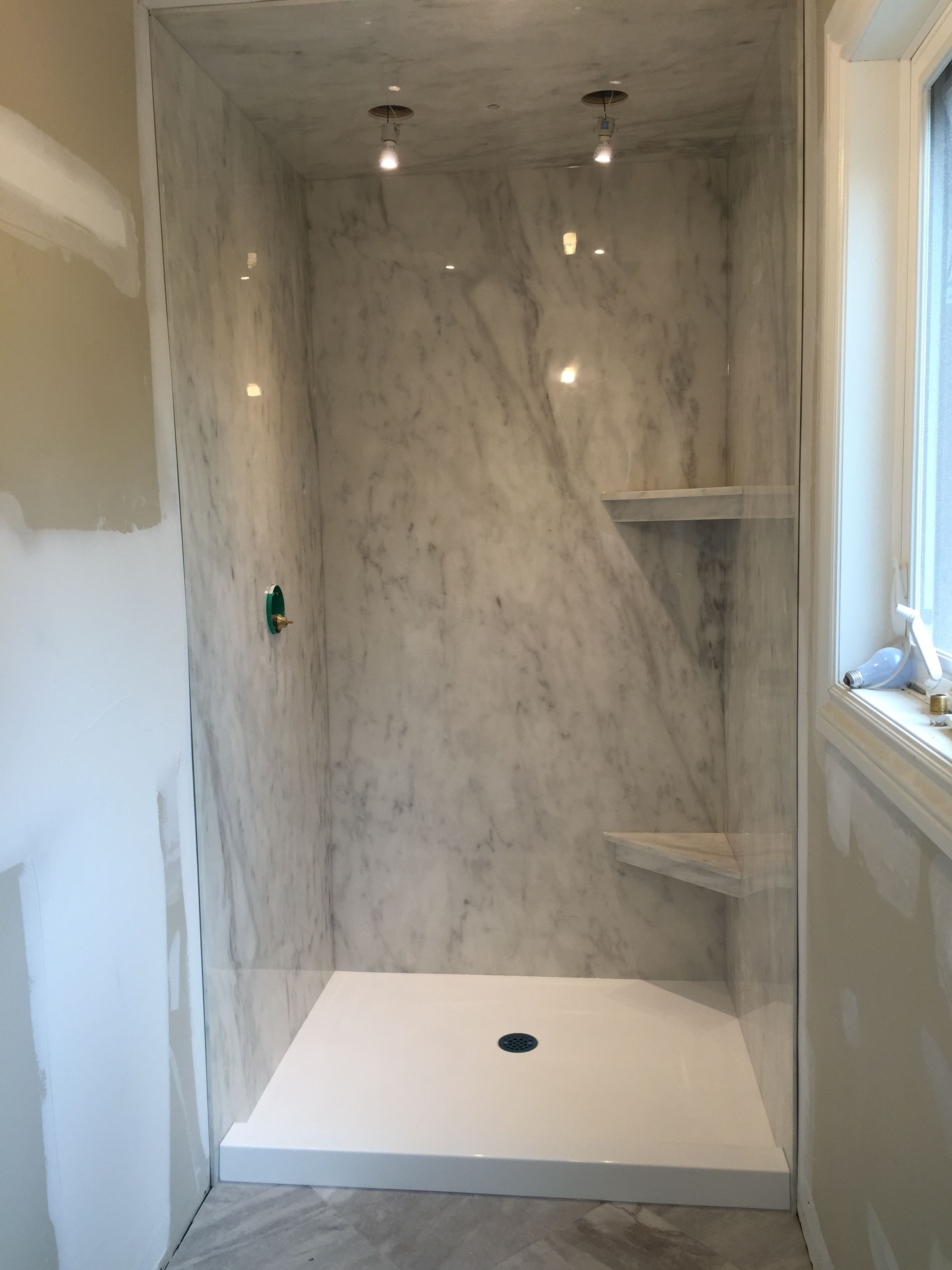 A Subtle Grey Marble Ite Shower Paired With A Bright White Cultured in measurements 2448 X 3264