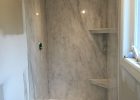 A Subtle Grey Marble Ite Shower Paired With A Bright White Cultured in size 2448 X 3264