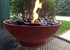 Diy Table Top Fire Pit Made With Black River Rocks And Real Flame within proportions 1320 X 1089