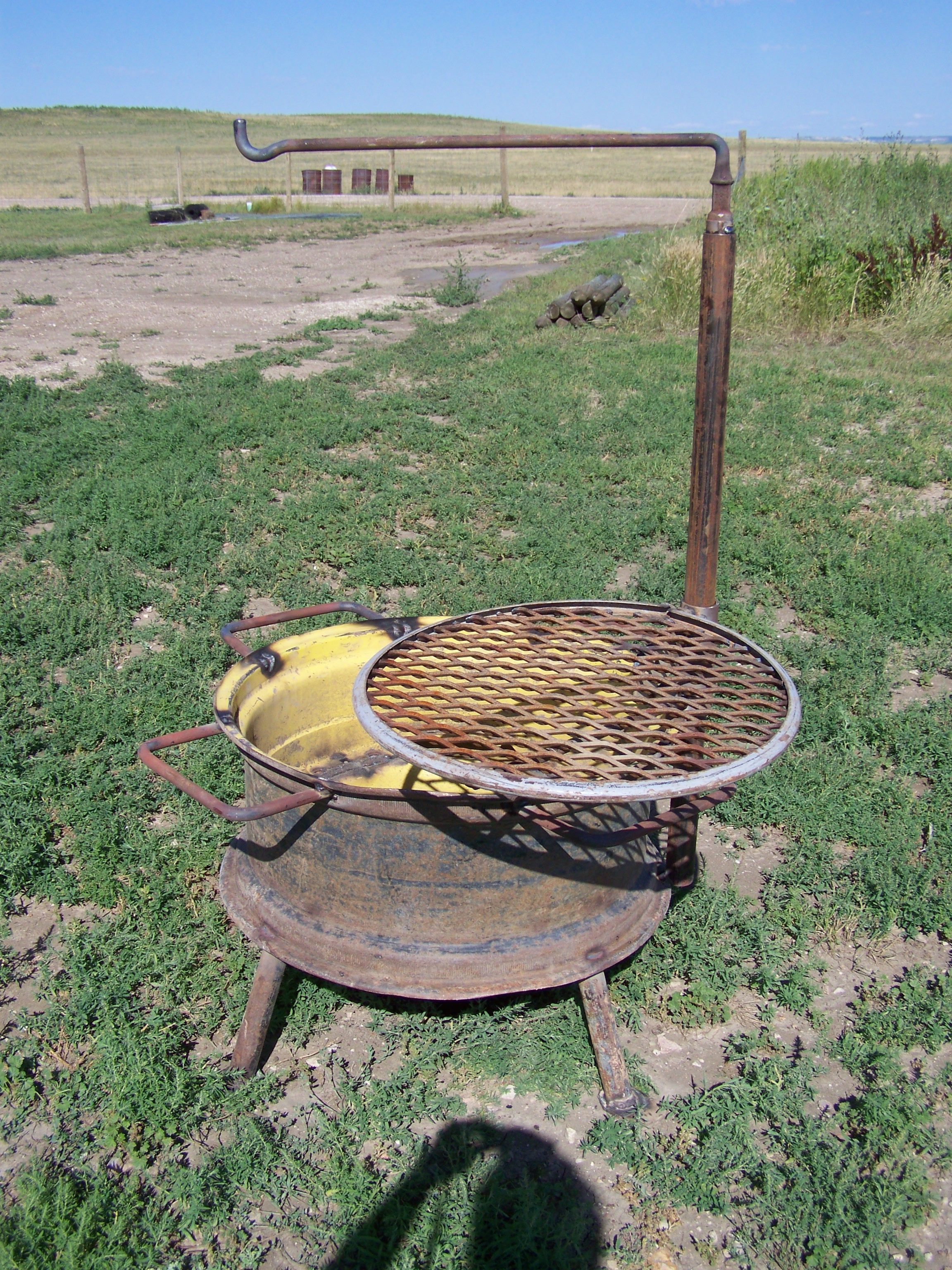 Fire Pit Made From A Tractor Wheel Grate And Steel For Holding Pots with regard to proportions 2304 X 3072