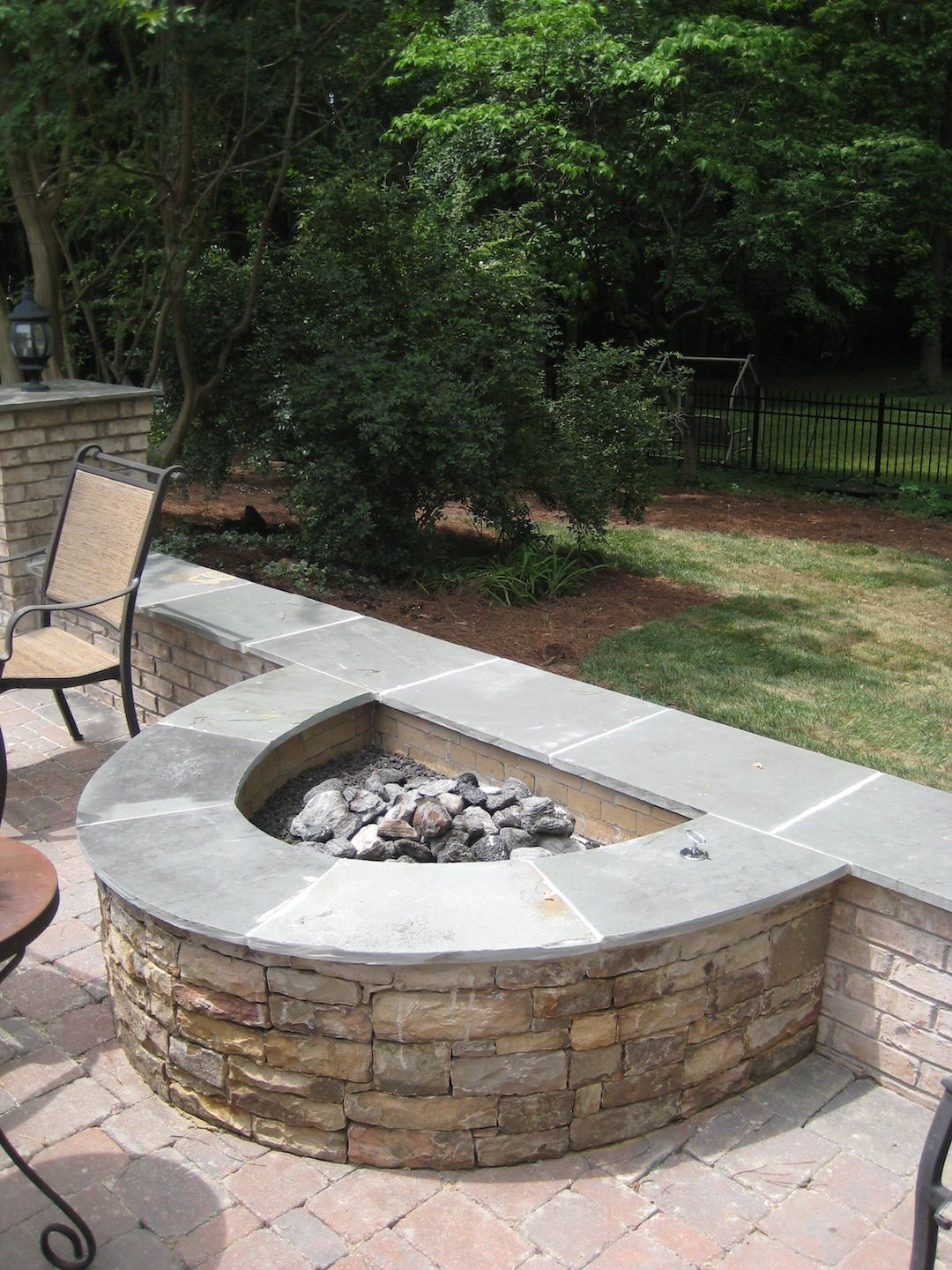 Half Circle Stacked Stone Firepit Fireplaces And Firepits intended for proportions 1080 X 1440