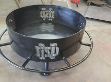 Notre Dame Fire Pit 36 With Boot Rest Custom Metal And Wood regarding dimensions 2133 X 1199