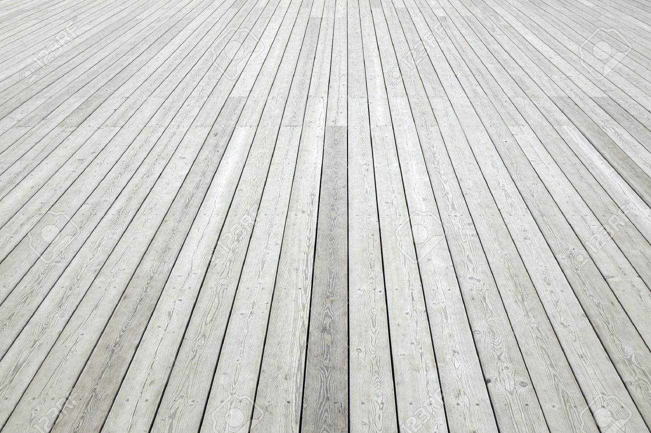 Perspective View Of Outdoor Shab White Wood Decking Background in size 1300 X 866