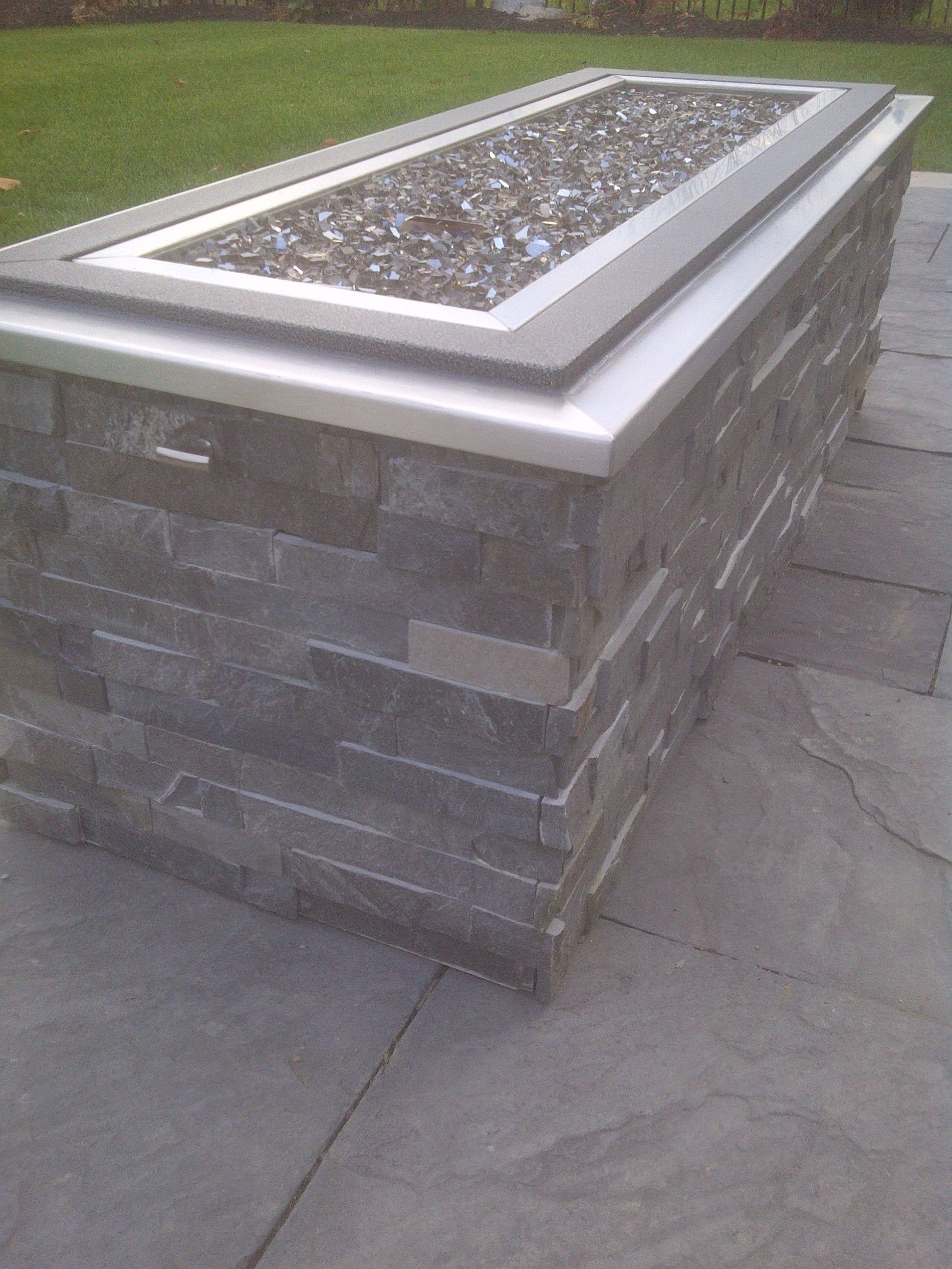 Raised Gas Fire Pit With Crushed Glass Stone Cladding And Stainless throughout size 1944 X 2592