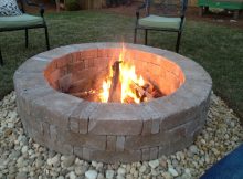 Rumblestone Firepit With River Stone Surround And Red Lava Rock with proportions 3264 X 2448