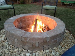 Rumblestone Firepit With River Stone Surround And Red Lava Rock within dimensions 3264 X 2448