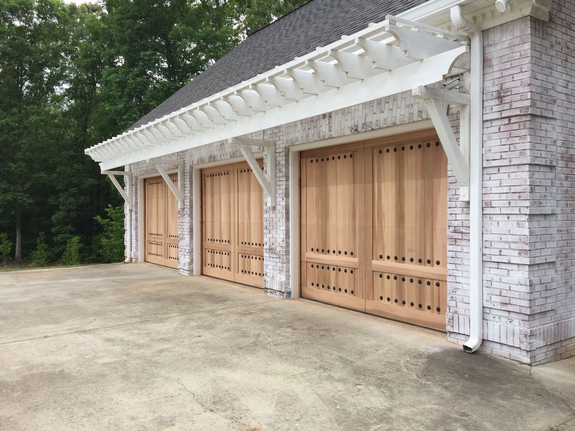 Transform The Look Of Your Home With A Custom Wood Garage Door Call within sizing 1136 X 852