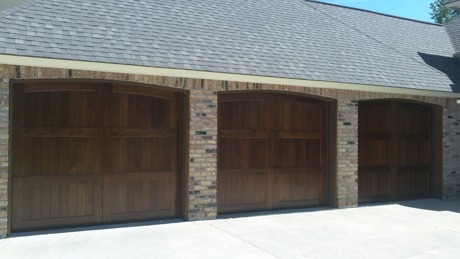 Wood Garage Doors Acadiana Garage Doors Lafayette Louisiana for dimensions 1500 X 844
